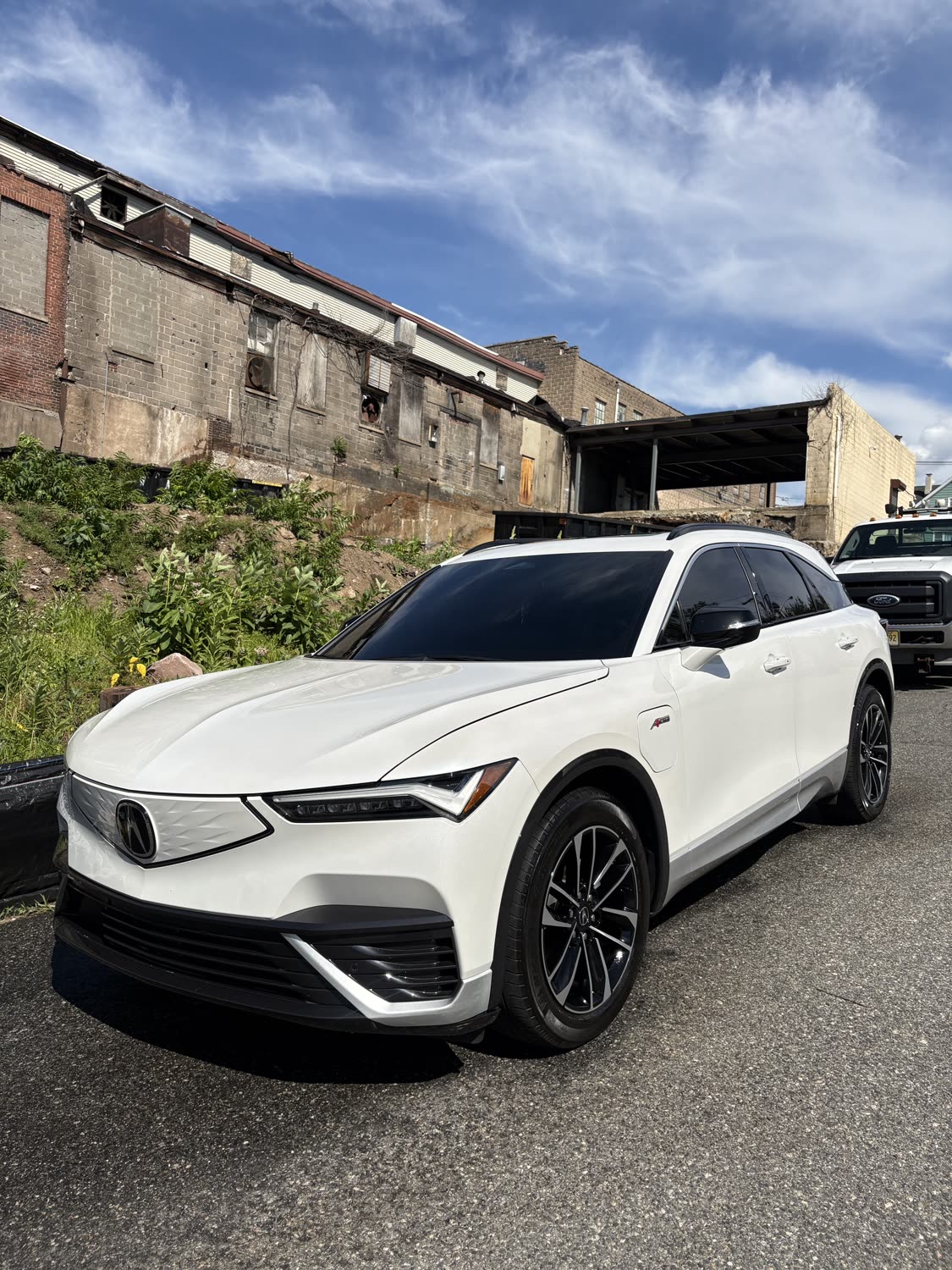 White Acura ZDX SUV freshly detailed