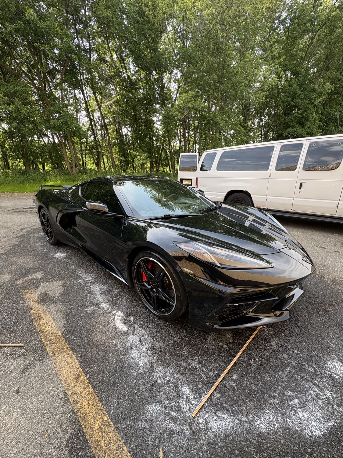 Glossy black Corvette C8 after a mobile detail